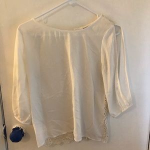 Fancy white colored shirt with fun design on back